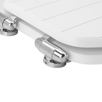 Close-up of chrome-plated soft-close hinges on a white soft-close tongue and groove MDF wood toilet seat
