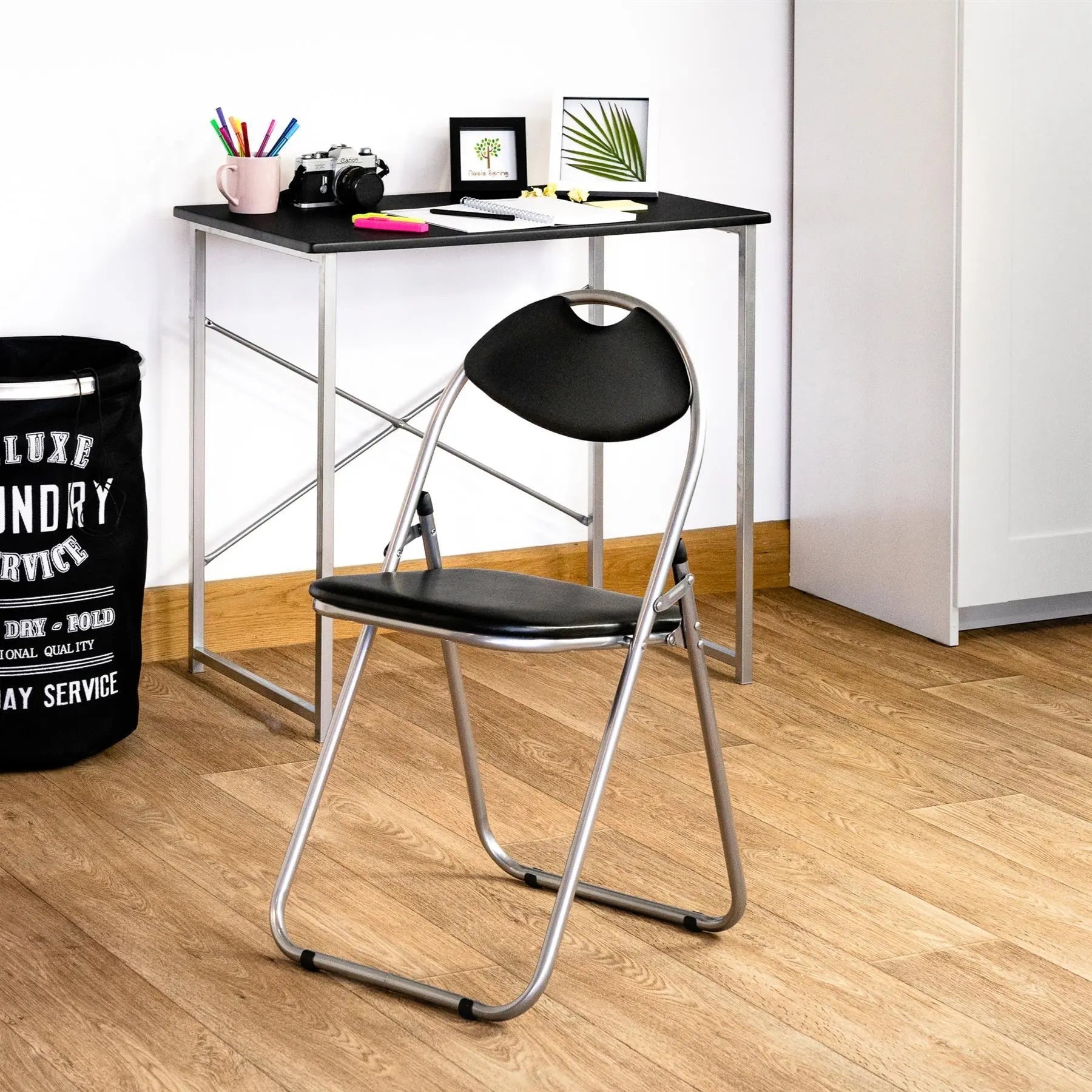 Black Curved Padded Folding Chair