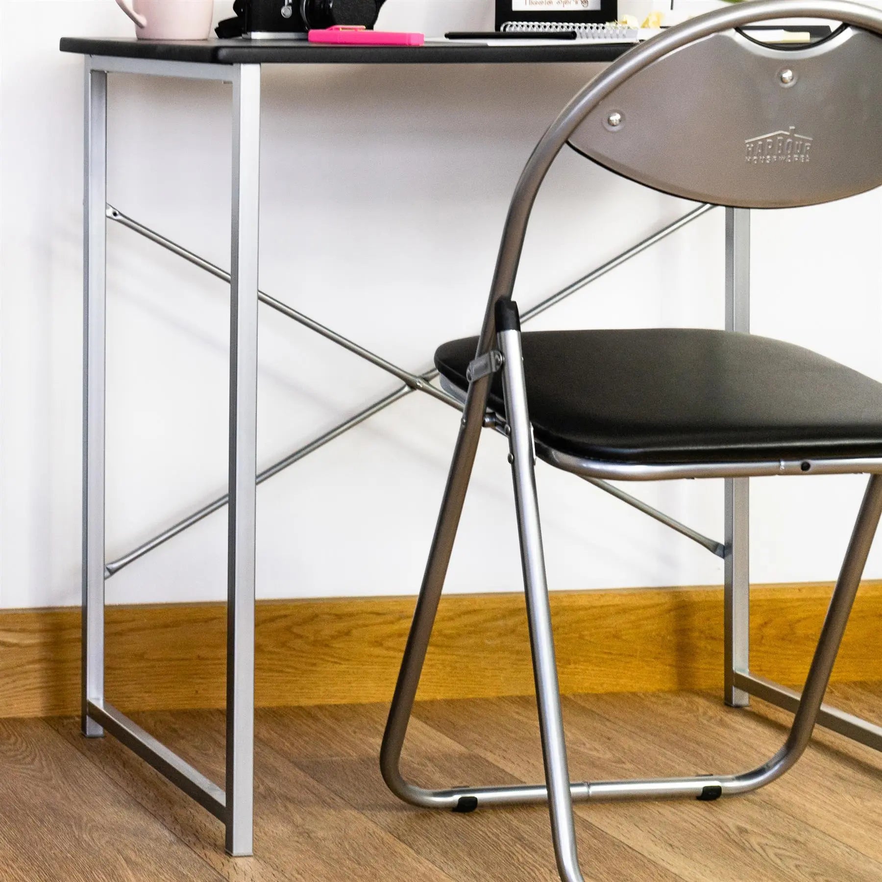 Black Curved Padded Folding Chair