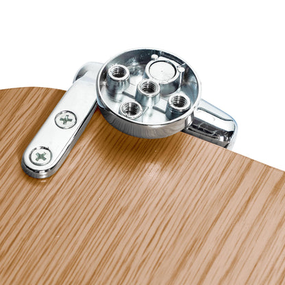 Close-up of chrome-plated soft-close hinges on a dark oak soft-close tongue and groove MDF wood toilet seat