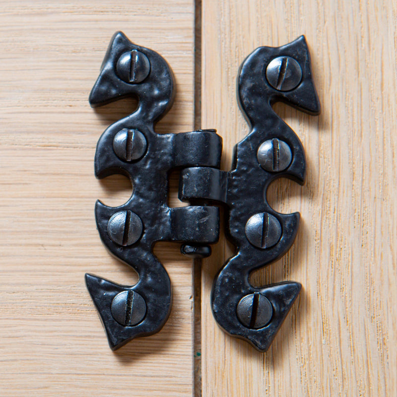 70mm Black Ornate Cabinet Hinge - By Hammer & Tongs