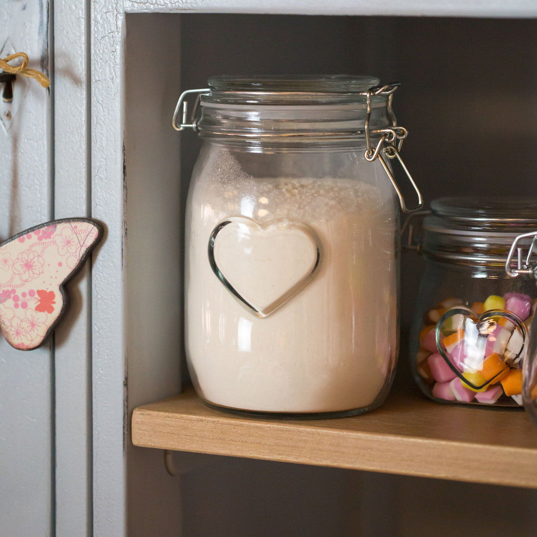 1.5L Airtight Glass Storage Jar with Embossed Heart Detail - Orange Seal